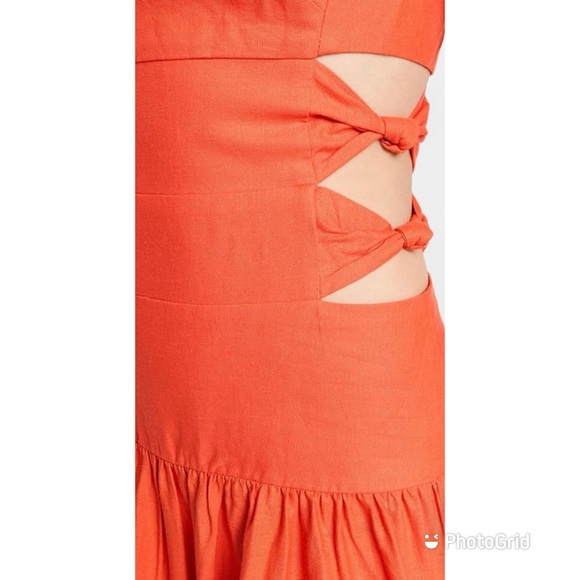 Precise knots detail the cutout sides of this FARM Rio midi dress. - Picture 5 of 6